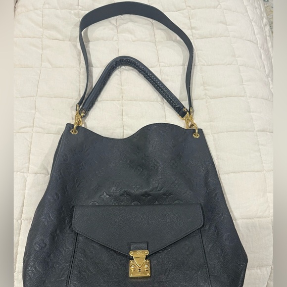 Louis Vuitton Black Monogram Bag with Gold Accents - Picture 9 of 12